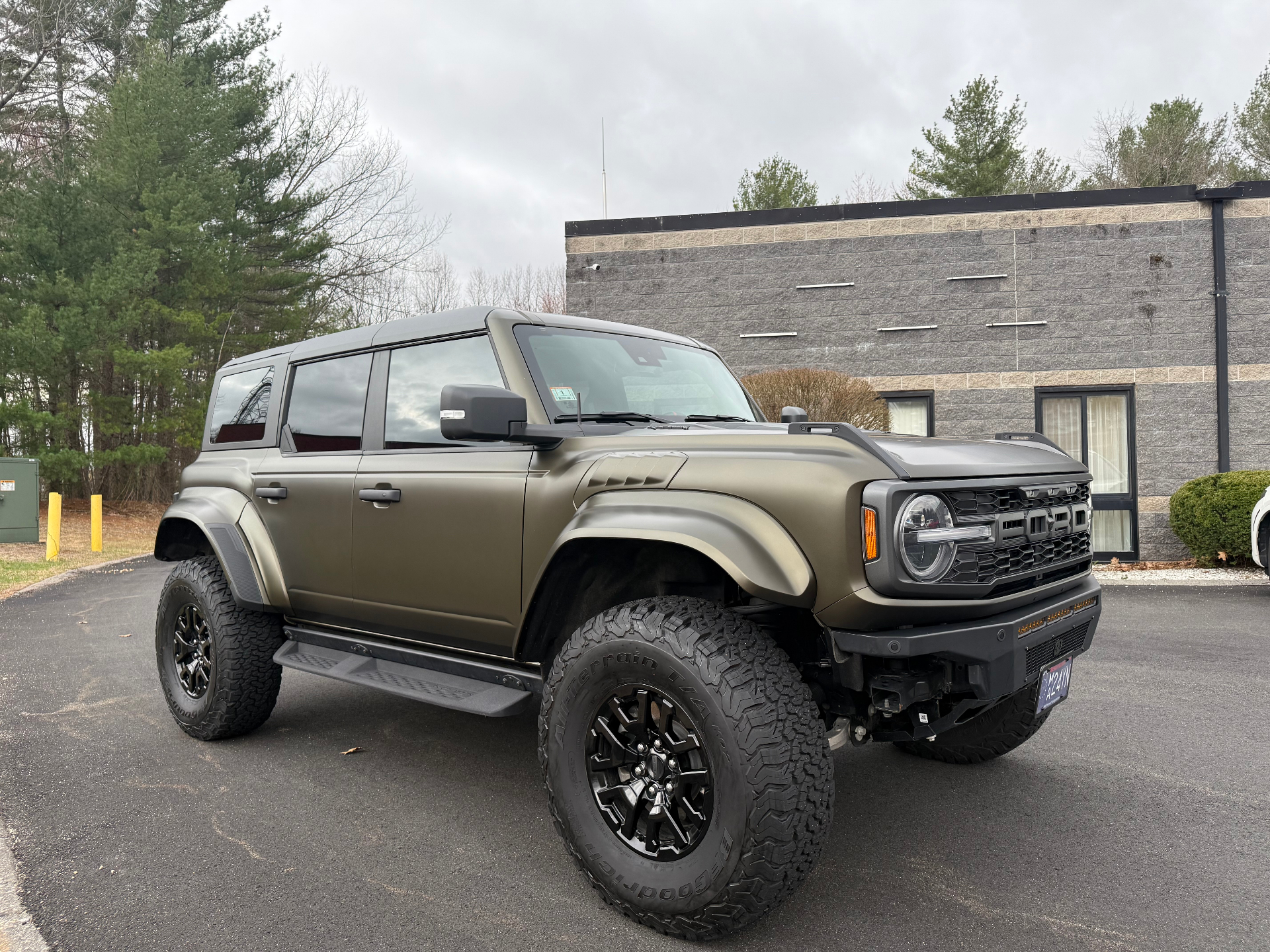 Matte green Ford Bronco photographed after customization work